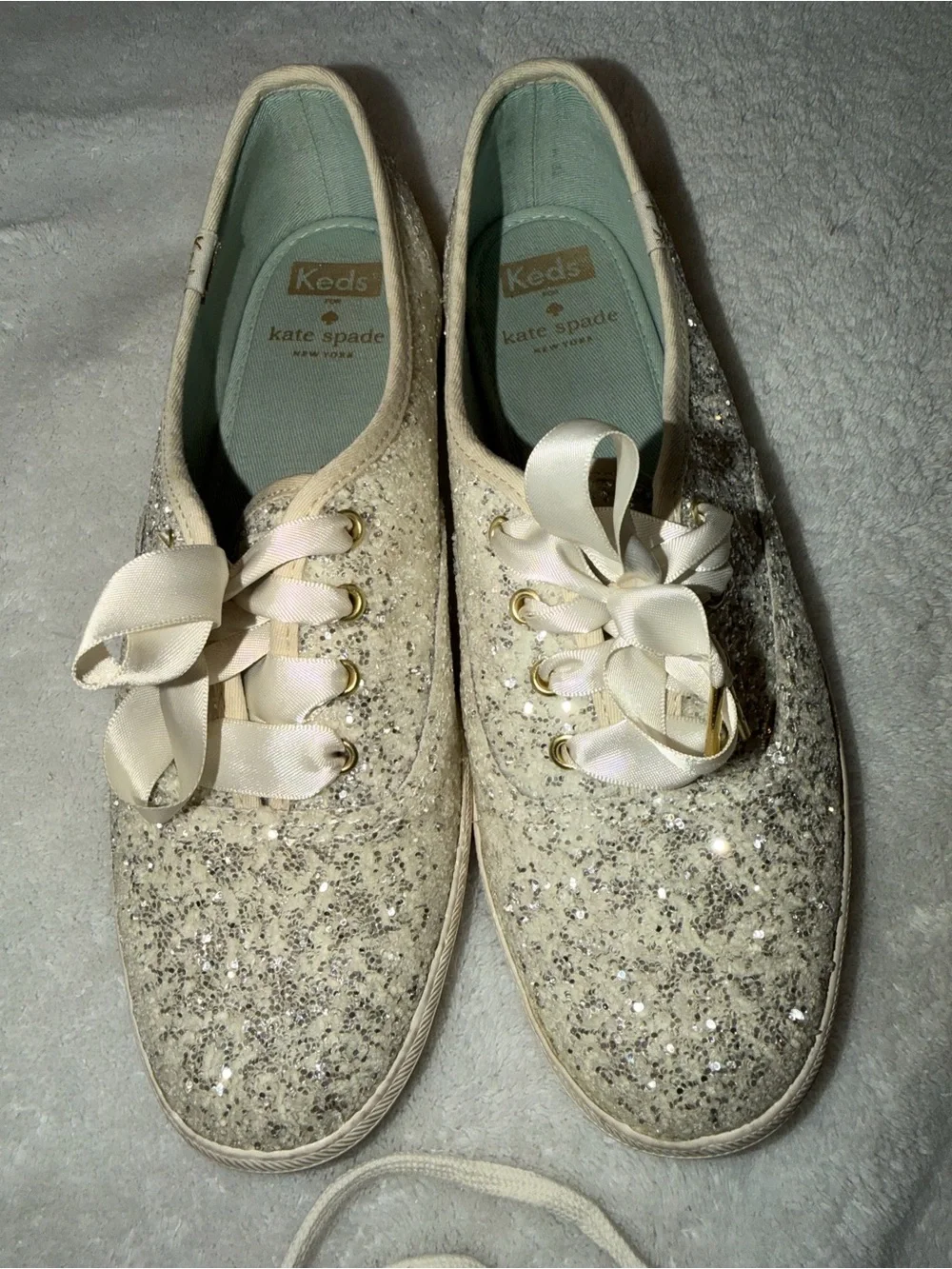 Keds x Kate Spade New York Glitter Sneakers in cream with original packaging